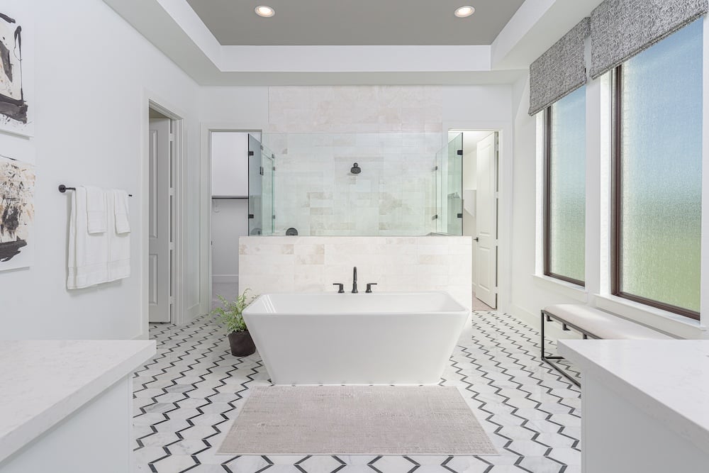 white bathroom with garden tub and separate shower