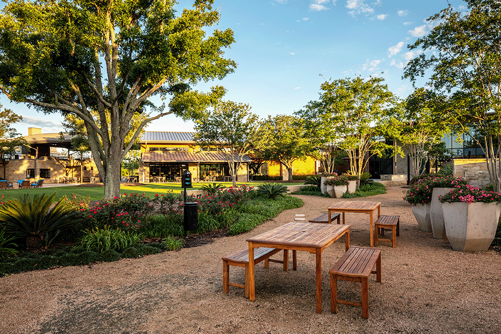 picnic tables and a beautifully landscaped park