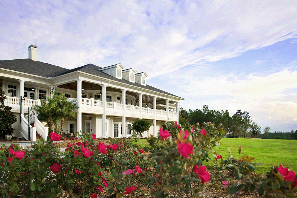 clubhouse with beautiful landscaping