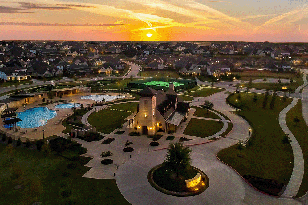 aerial view of community amenities at dusk