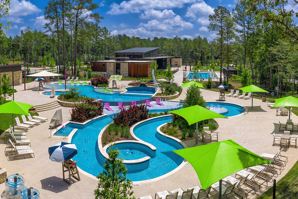 resort style pool with lounge chairs