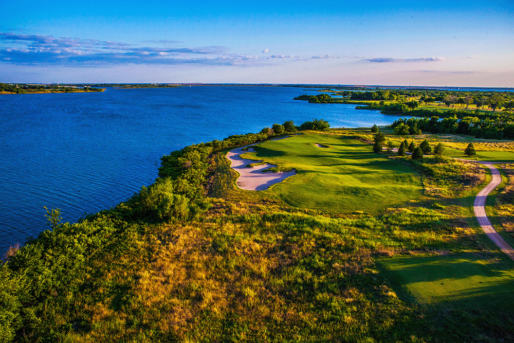 Golf course aerial view with a lake