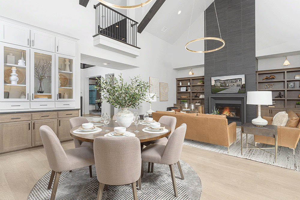 open concept family room and breakfast area with warm tones